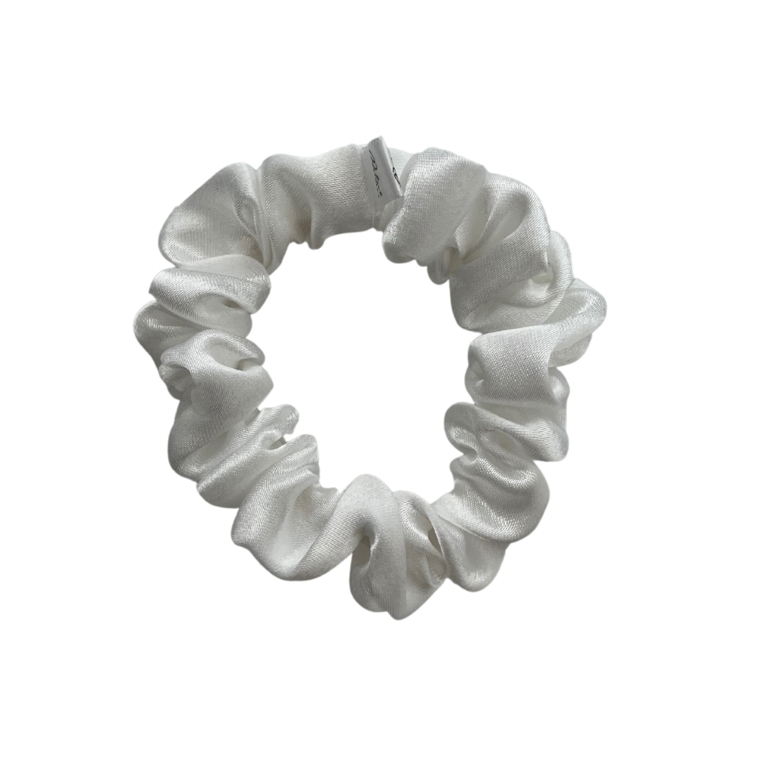 A white satin scrunchie displayed on a white background.