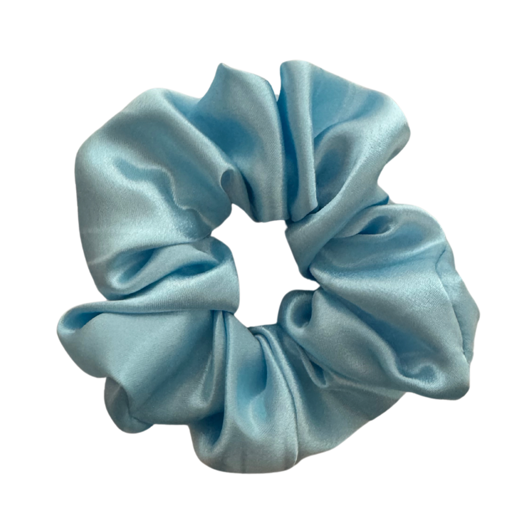 A blue satin scrunchie displayed on a white background.